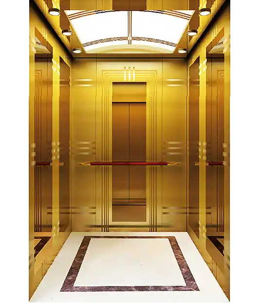 Gold-colored passenger elevator with a polished marble floor, showcasing a luxurious design.