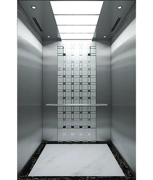 Modern passenger elevator featuring a marble floor and sleek glass walls.