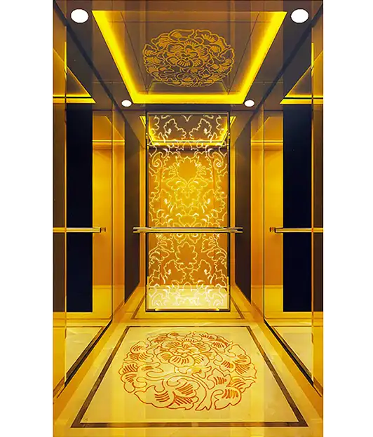 A passenger lift featuring elegant gold and black walls and floor, creating a luxurious atmosphere.